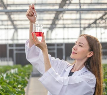 scientist working in organic agriculture farm research new chemical formula